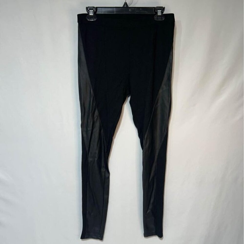 Womans black leggings with vegan leather panels. Excellent condition. Elastic wa